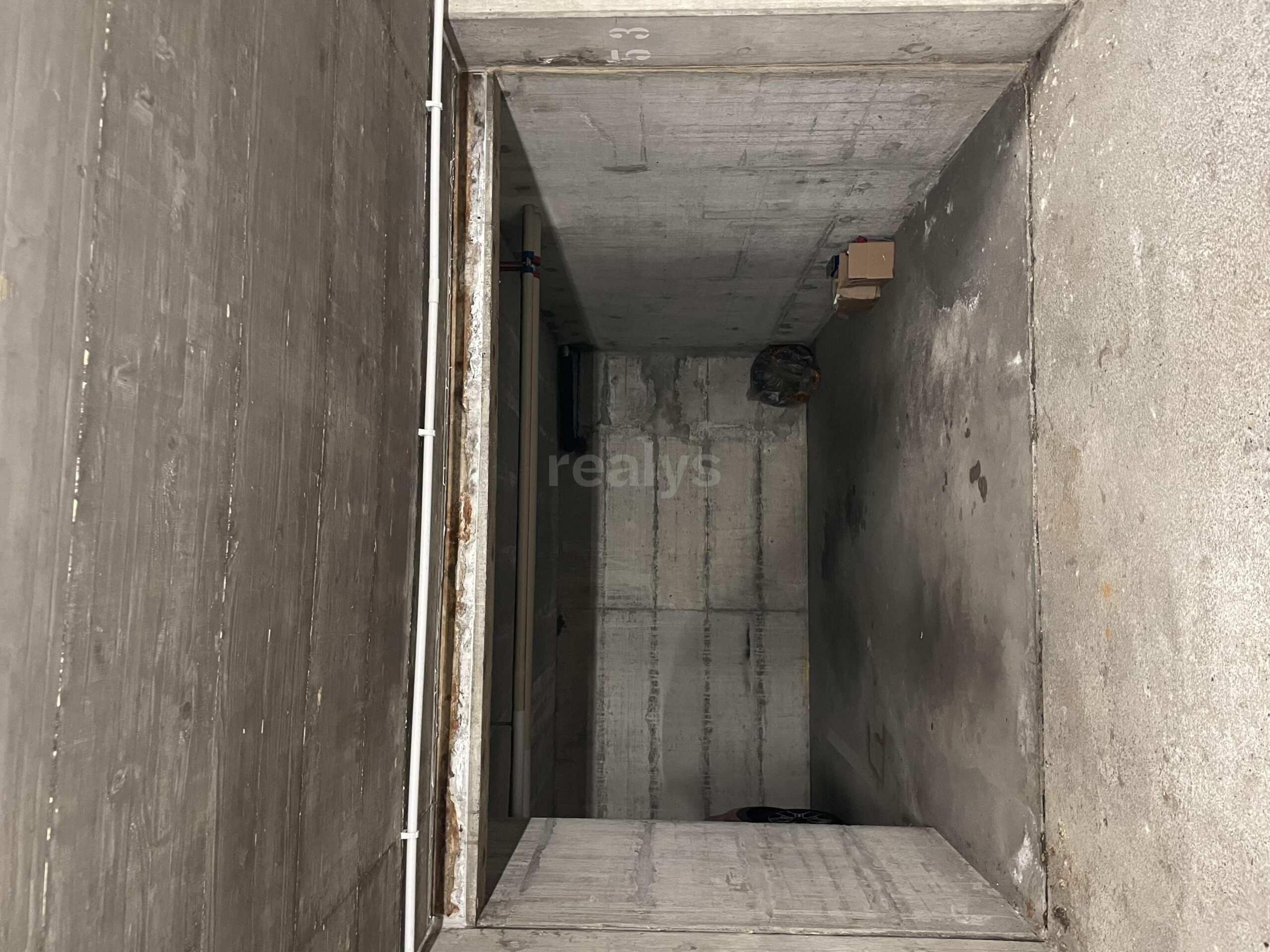 PrivaliaPlace de parking couverte au 1er sous-sol intérieur dans un immeuble résidentiel