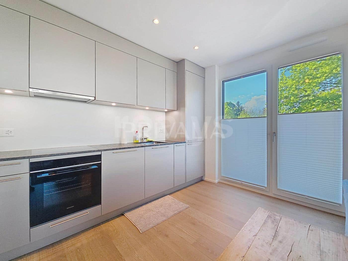 PrivaliaBel appartement contemporain à deux pas du lac avec accès à une plage privée